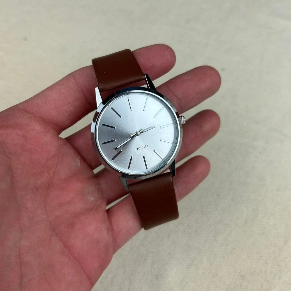 Minimalistic essential vintage style watch stainless steel brown and silver